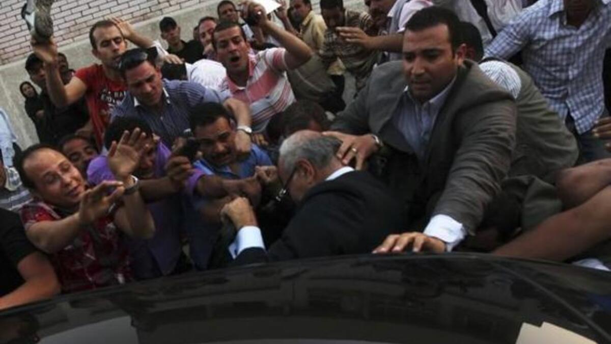 Ahmed Shafiq's had a shoe thrown at him during elections