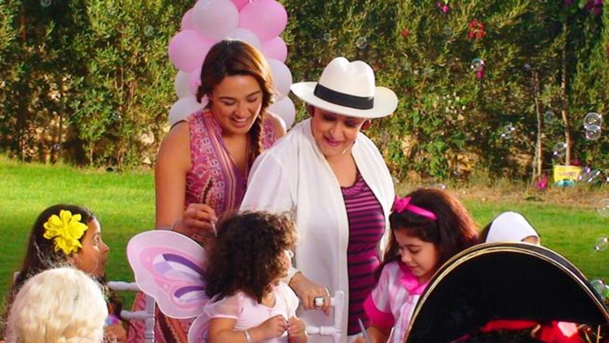 Star singer ‘Warda’ Al-Jaza'eriya (Known by her family name, translated, 'the Algerian'), aptly, Algerian origin, celebrates her birthday
with her new grandchild, and the release of a new video clip.