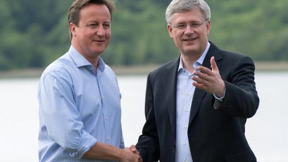 رئيس الوزراء الكندي "ستيفن هاربر" مع "كاميرون" في قمة الثمانية