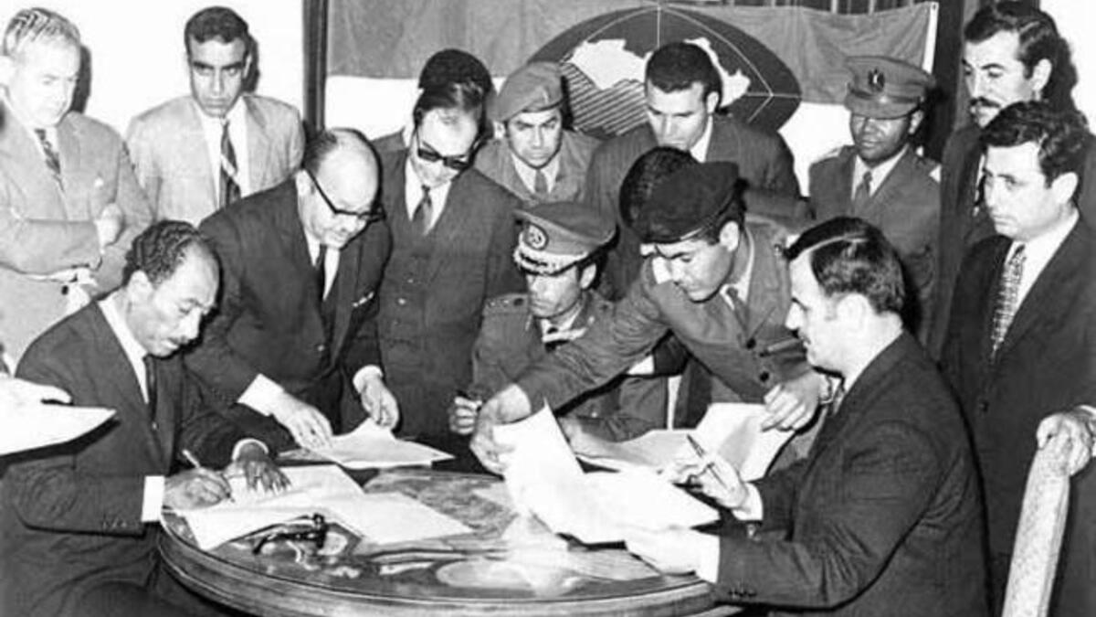 He kept controversial company: April 18, 1971 Syria´s President Hafez al-Asad (R) with President Anwa4r Al-Sadat (L) of Egypt and Qaddafi(sitting in the center).