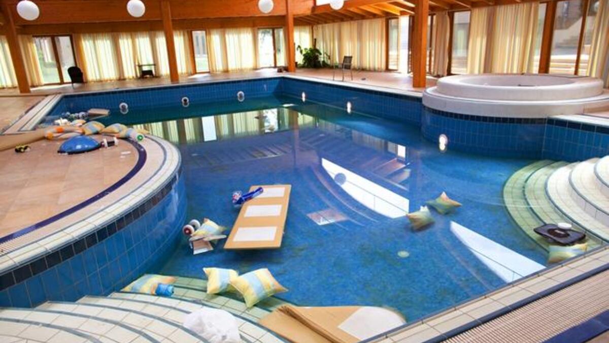 Other rooms in Aisha's humble abode. Evidence of child-play by the pool-side, suggesting
that this ostentatious show-case of suites, while uninhabited now, was part of a family home.