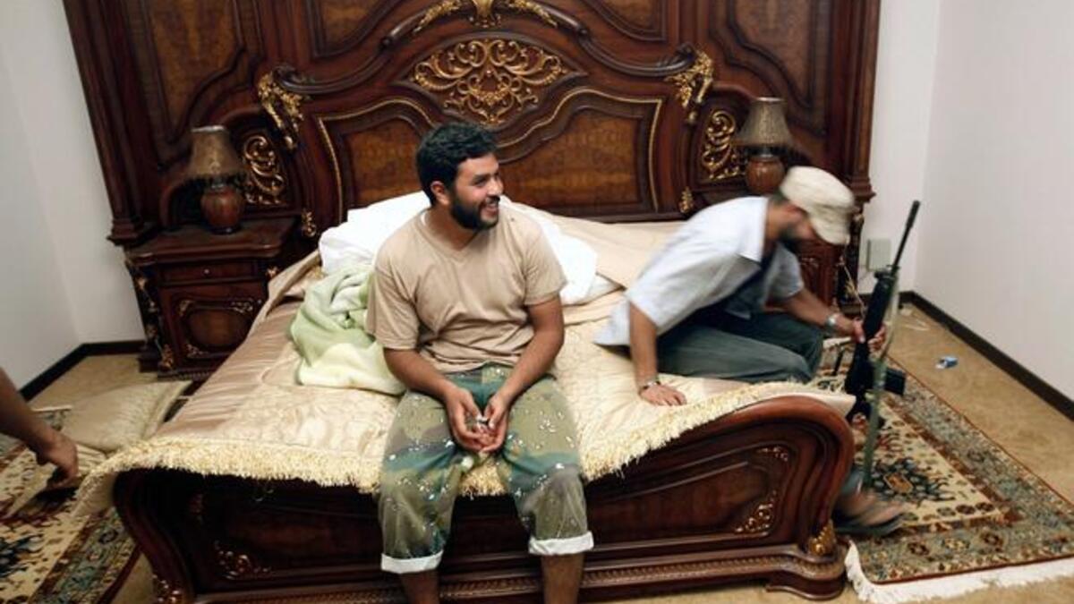 Father Gaddafi's very own rustic retreat: Here, images of his farm house. A nomadic tribesman at heart, he was Lord of the
Manor when it took his fancy, and would switch between city palace, country villa, and desert-side tent, according to whim.