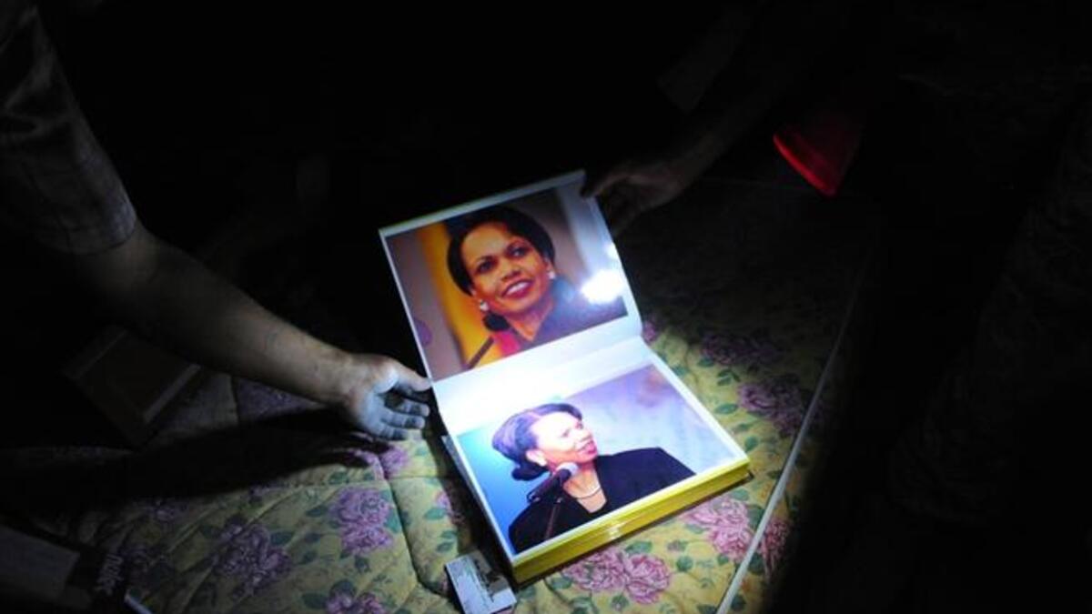 Condy 'Leezza' Rice. Seems that Gaddafi appreciates America's former leading lady- Secretary of State-- a whole album's worth
of appreciation. Many shots snapped surreptitiously during a state visit, Gaddafi met Condoleezza Rice in 2008,,and took to 
calling her 'leezza'.