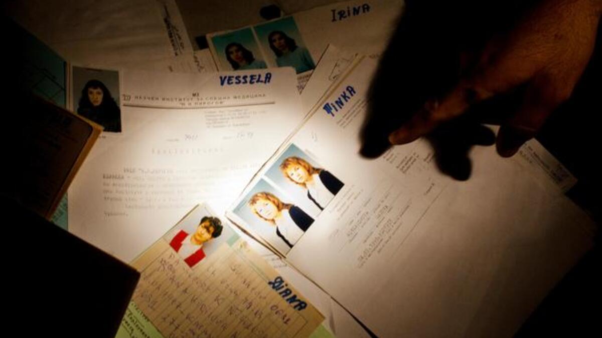 Medical leaks: What once private, now open to public gaze. Rebels pry through records of medical staff at a private hospital in Gaddafi's main military compound. A symbolic victory spot, 
fast turning tourist attraction, to plunger & pillage. Family portraits are of more interest than medical records, unless those unearthed are of the Gaddafis.