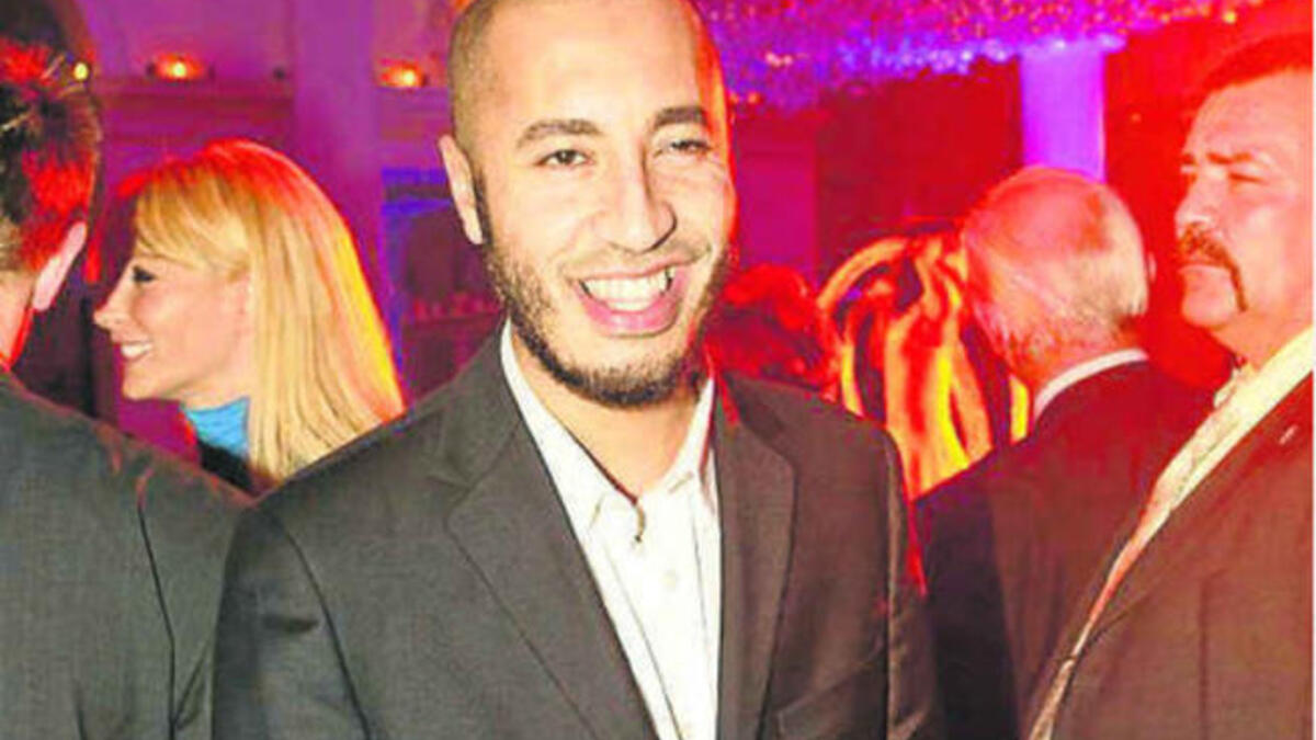 Saif al-Arab Gaddafi - one of the youngest sons, he keeps his head low and lives in Germany.  The most noise to come from him has more precisely come from his car engine.  In 2008 his Ferrari was clamped  by German police because of a noisy exhaust.