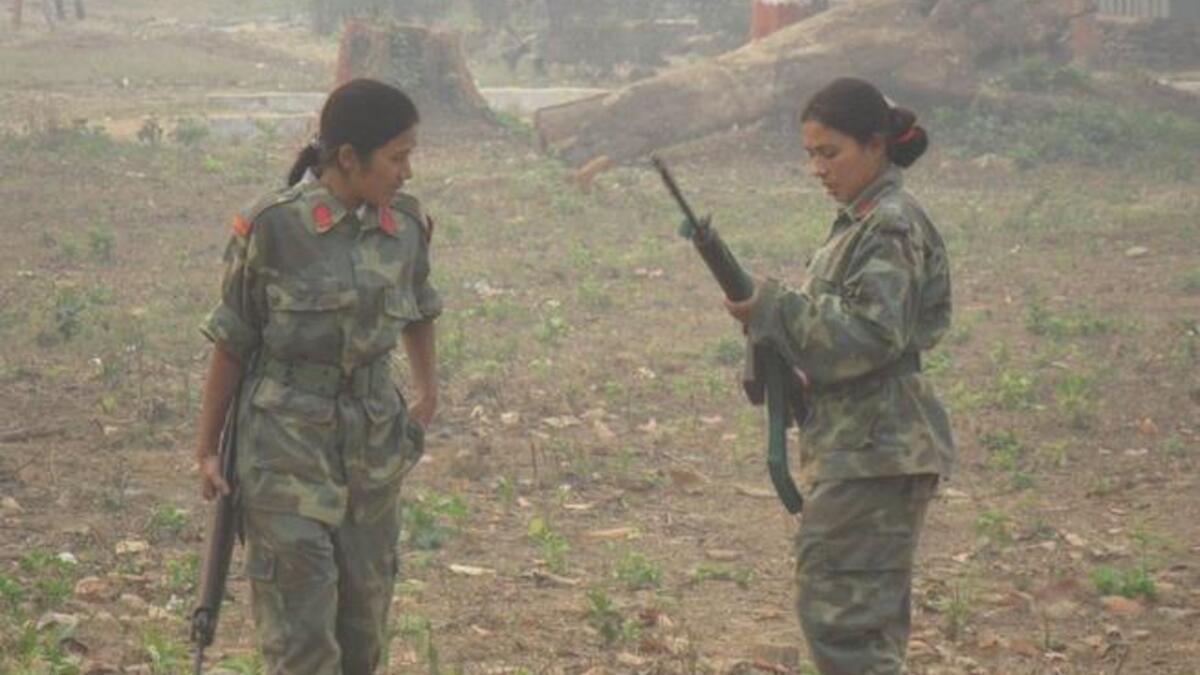 Gaddafi in safe hands. These ladies are trained to kill. Don’t be fooled by appearances: some of these lasses are real gems, but they will dazzle you like the deadly green glow of kryptonite if you mess with their Man.