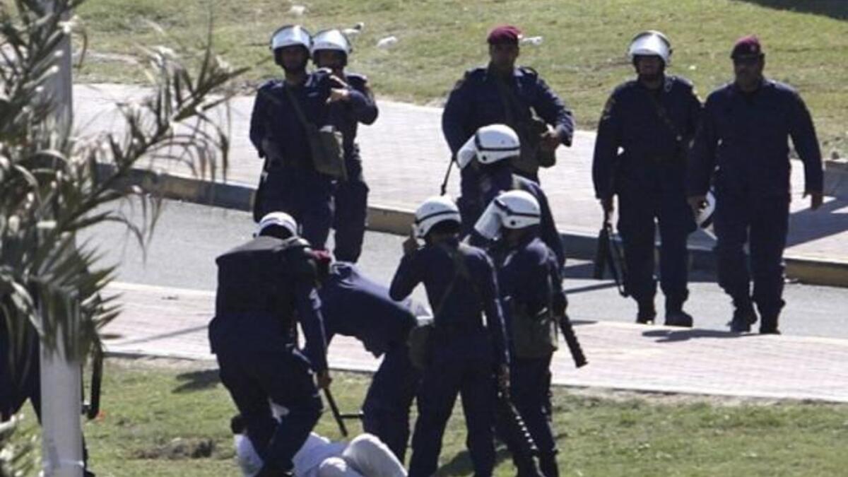 Bahrain Shia protests police beating