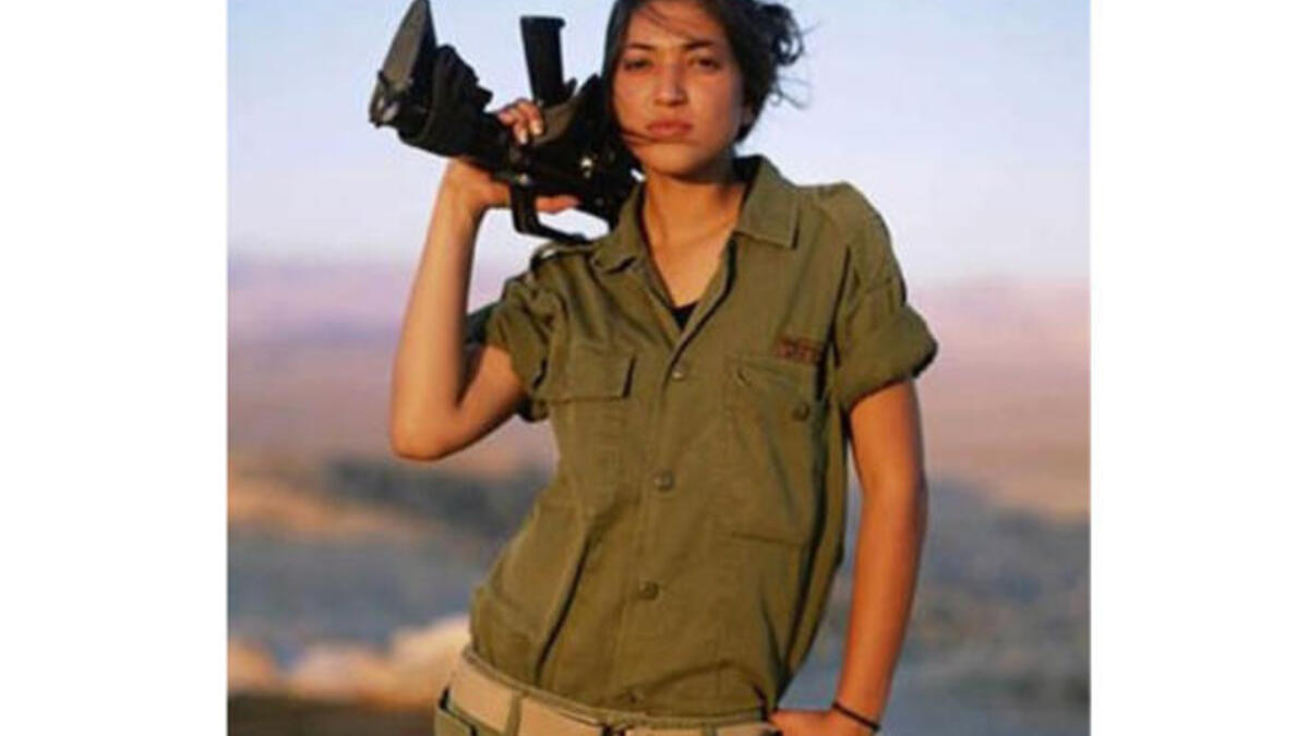 She’s gonna shoot you with Cupid’s arrow, but use bullets instead.