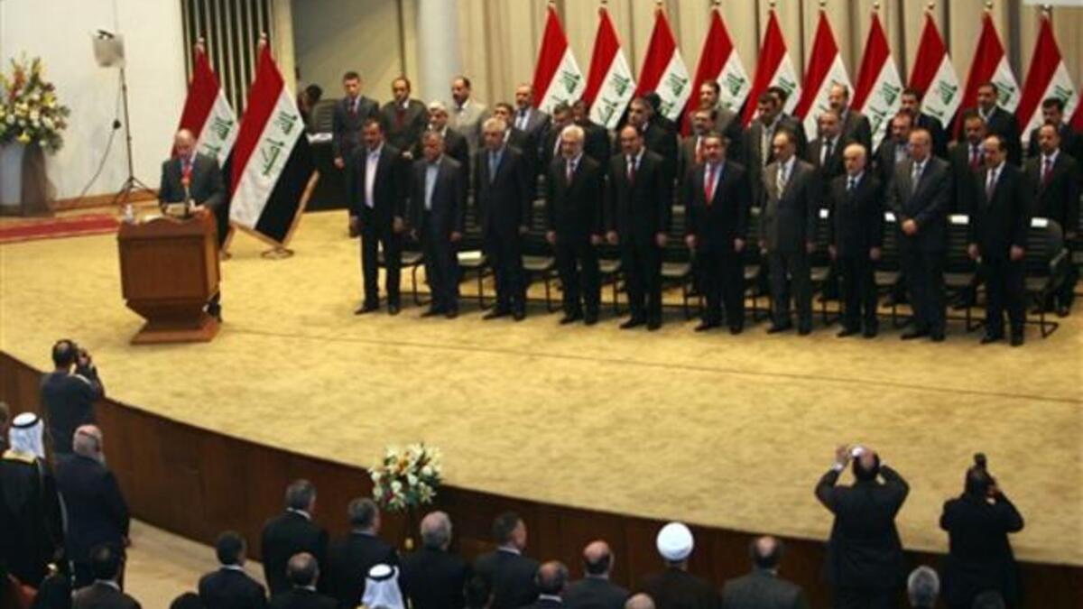 Iraqi Parliament Speaker Osama al-Nujaifi addresses the parliament as lawmakers gave Prime Minister Nuri al-Maliki's government a vote of confidence and adopted a 43-point program