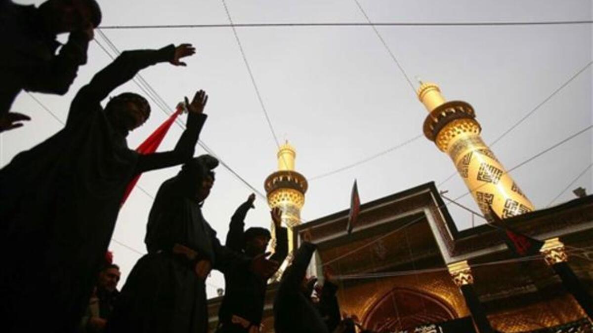 Shiite Muslim men beat their chests in an Ashura ritual in the shrine city of Karbala in central Iraq, as believers prepare to mark the religious event of Ashura in commemoration of ten days of mourning for Imam Hussein, the grandson of Prophet Mohammed who was killed in the Battle of Karbala.