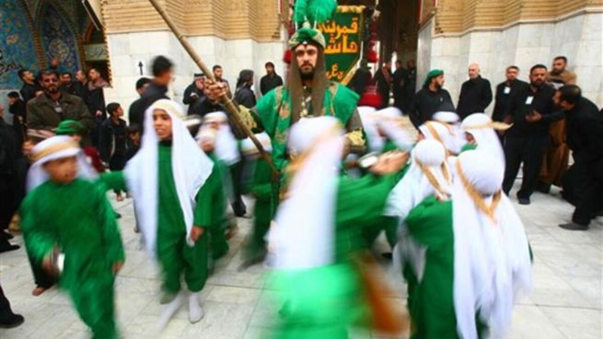 Shiite Muslims act the story of Imam Hussein in an Ashura ritual in the shrine city of Karbala as believers prepare to mark the religious event of Ashura in commemoration of ten days of mourning for Imam Hussein, the grandson of Prophet Mohammed who was killed in the Battle of Karbala.