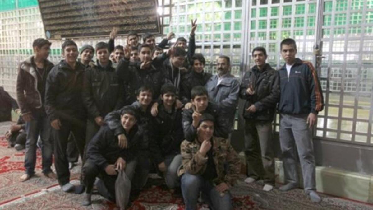 Iranian high school students visit the shrine of Ayatollah Ruhollah Khomeini.
