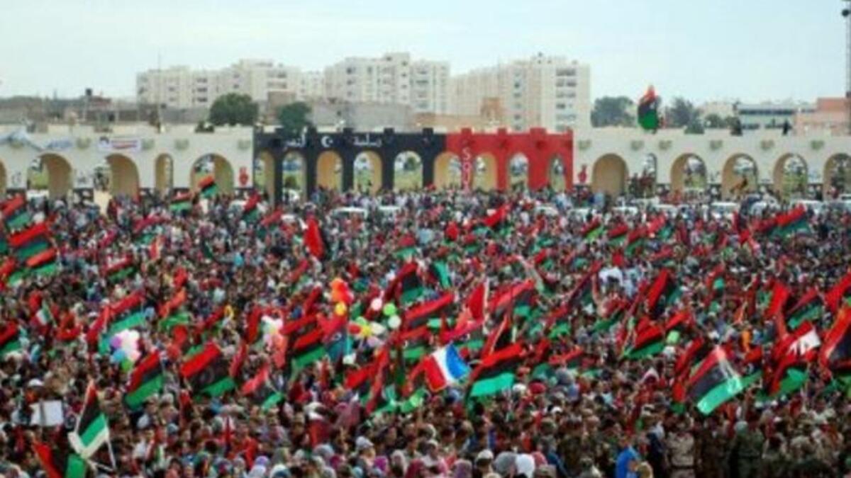 Thousands of Libyans celebrate during a ceremony announcing the liberation for the country in the eastern city of Benghazi  after ousted despot Moamer Kadhafi was captured and killed. A series of optimistic speeches by the new interim leaders ushered in the new age of Libya and paying tribute to the courageous efforts that got them to this point.