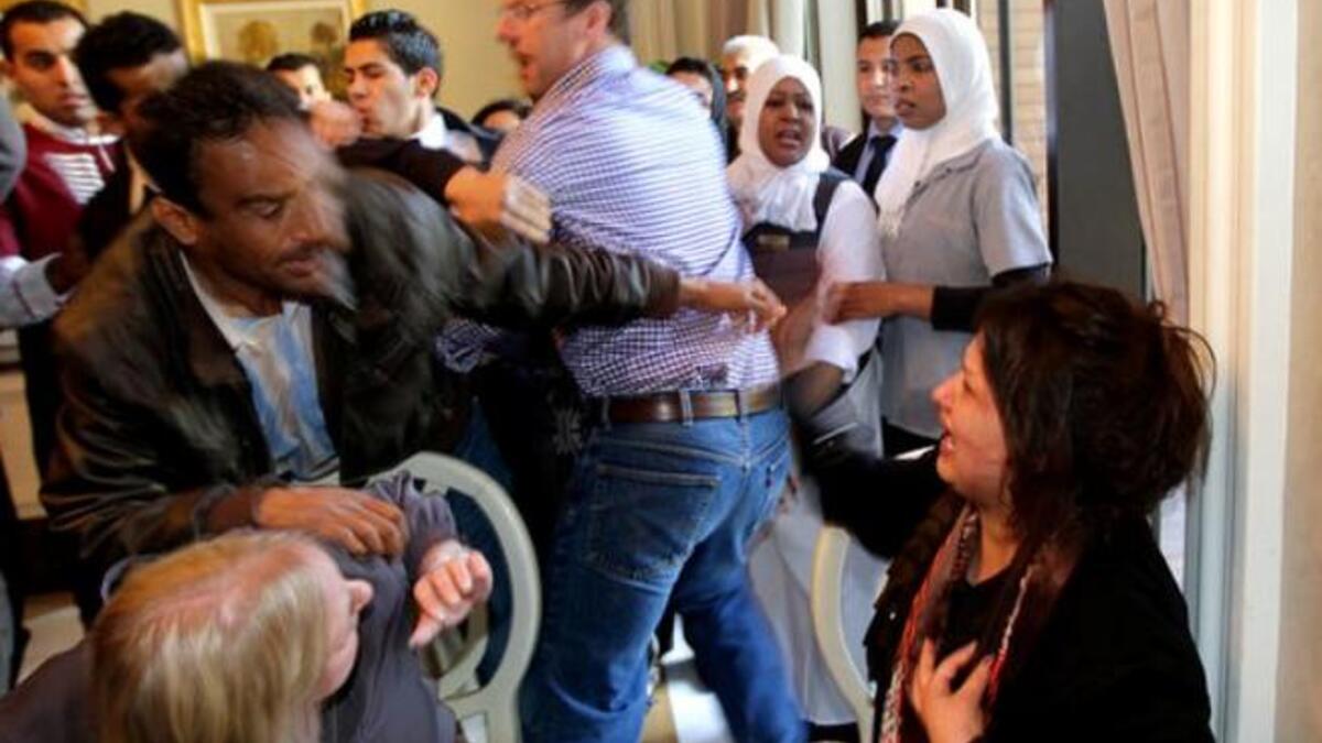 At one point she tried to shout to us in English, “15 men slept with me.”