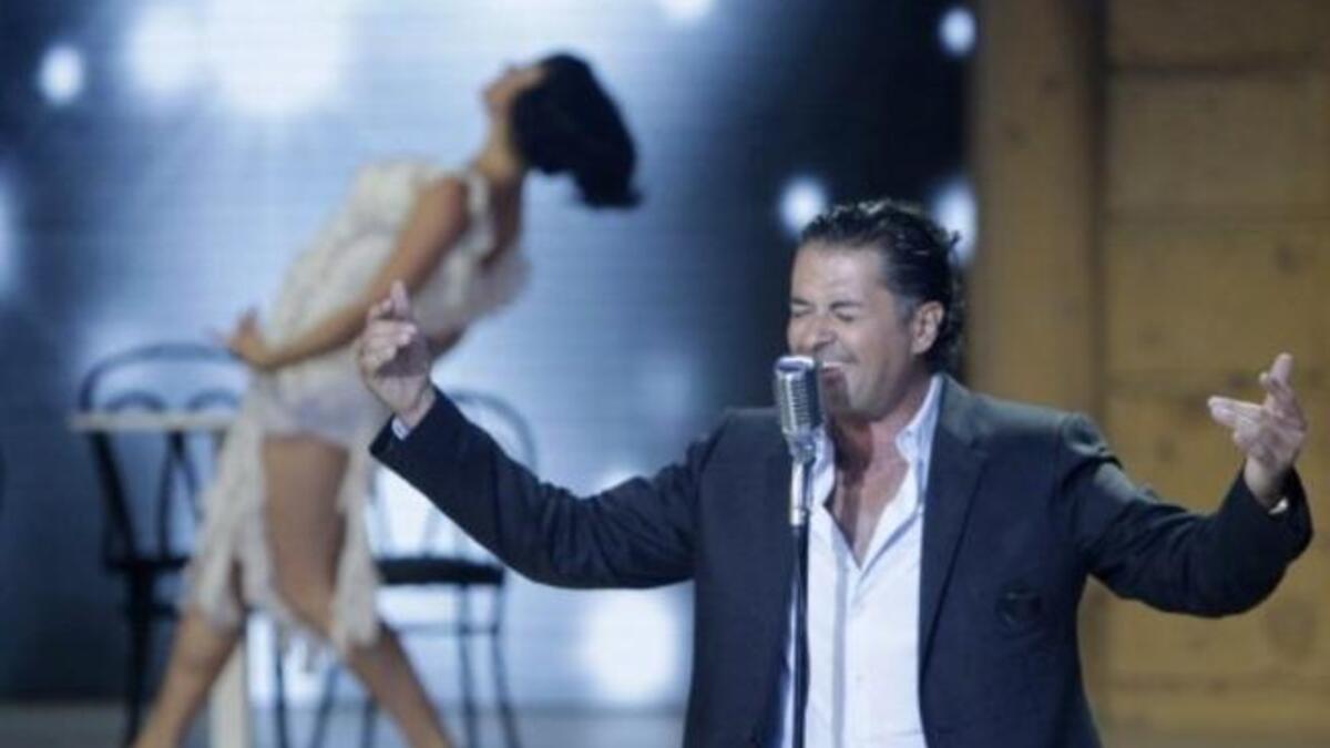 Lebanese singing star Ragheb Alameh performs during the Miss Lebanon 2011 beauty contest.