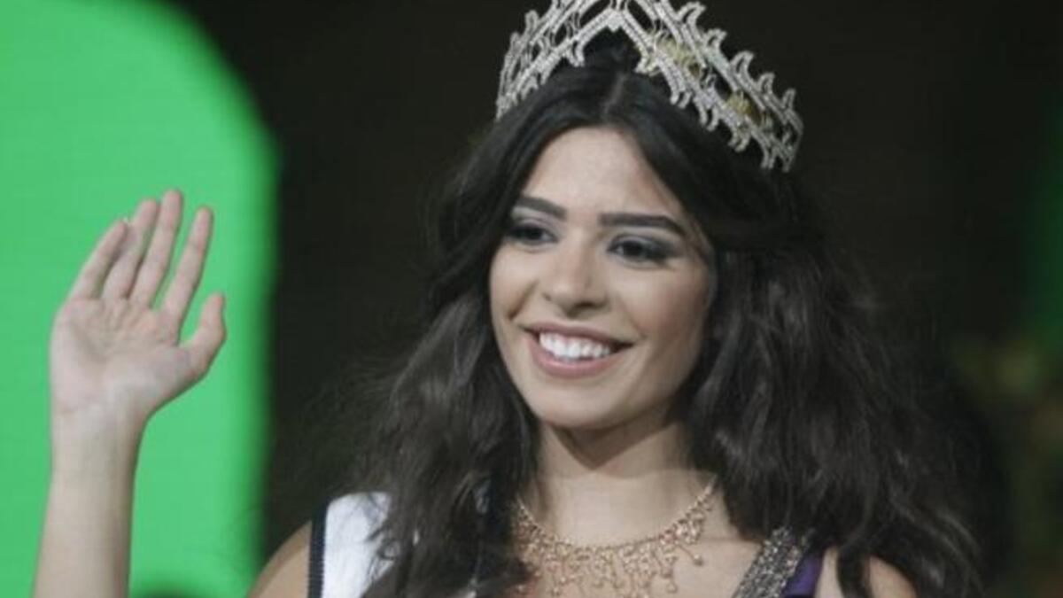 Yara Khoury Mikael waves after winning the Miss Lebanon 2011 beauty contest.