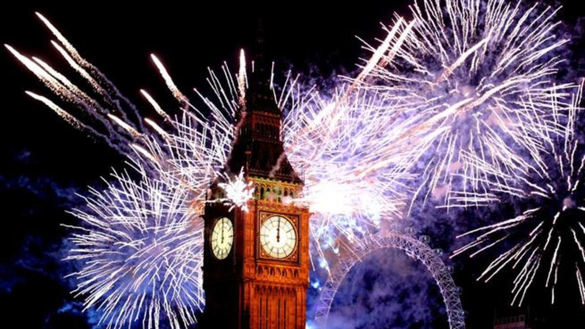 Fireworks light up the London skyline and Big Ben just after midnight in London, England. Thousands of people lined the banks of the River Thames in central London to see in the New Year with a spectacular fireworks display.