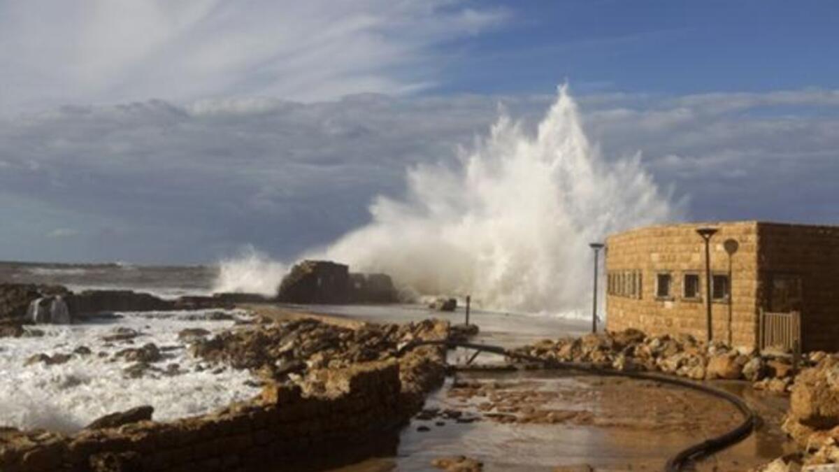 Waves smash into breakers protecting the Roman-era port of Caesarea after a massive storm battering the eastern Mediterranean destroyed the breakers threatening to wash away the historic site, Israeli officials said.