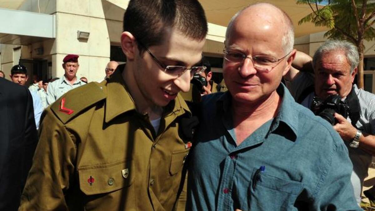Dad & son reunite: Noam's 'gaunt' son, skinny at best entering captivity, but still thin as a developed man, will need time
to recover, says Father. Five years with Hamas, & 'Hummus', in Gaza didn't do much for his physique. Meanwhile Palestinian 
families fussed about preparing their returnee children favorite dishes as stuffed vine leaves.