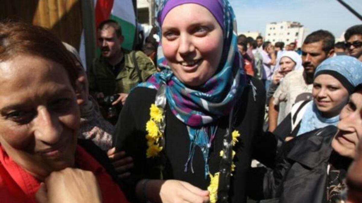 Palestinian Ukranian: Irina Polishchuk released after serving 9 years of a 20-year sentence for her logistical-role in a terrorist attack.
Reunited with daughters, her husband remains in prison. Other stories included married & pregnant daughter
meeting father she never knew. Mothers fainted to see their prodigal, or untried, sons return.