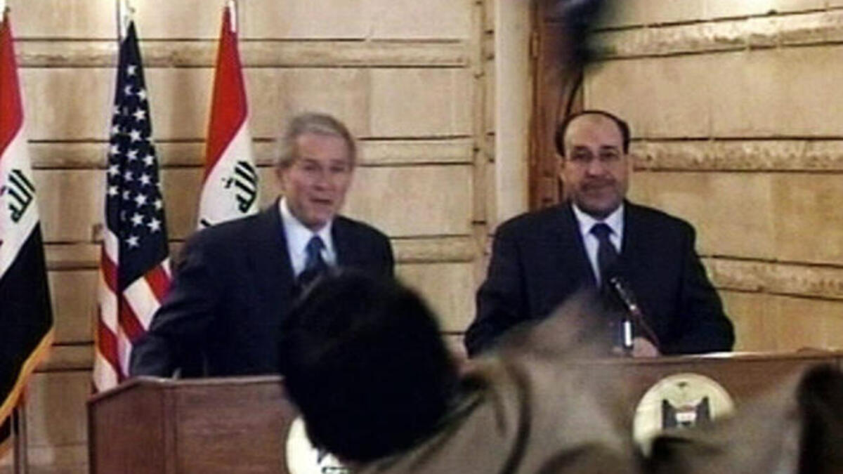 george bush shoe throw