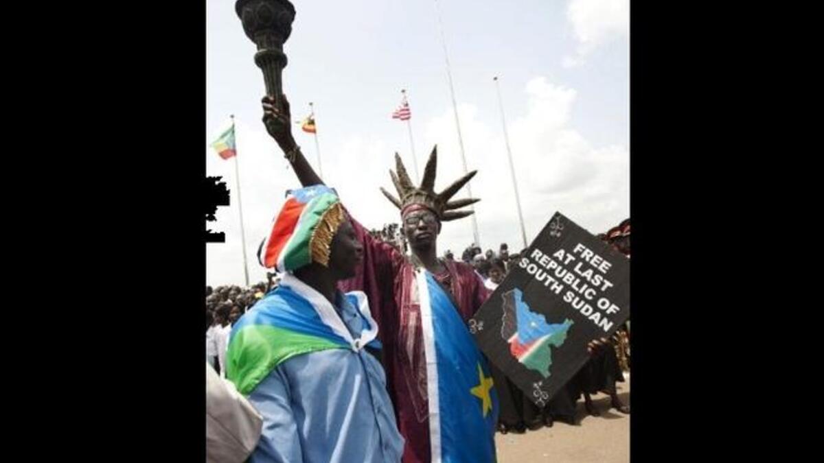 A South Sudanese man disguised as the Statue of Liberty of the US attends celebrations marking South Sudan's independence in Juba  as it seceded from the north and became the world's newest nation.