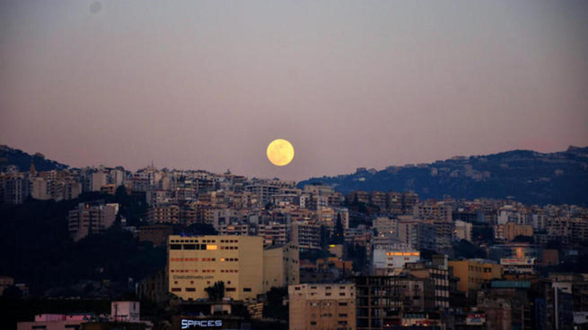A supermoon rising up and above Beirut, Lebanon.