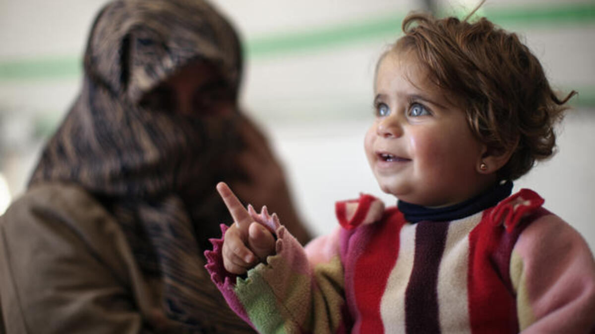 baby refugee camp (UNHCR/ B. Sokol)