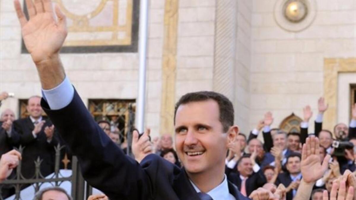 Hailing his people and power, a smiling, smug Bashar is not so formidable as father who ruled by force, and it is perhaps his cronies and military that lend him the iron fist he nevertheless wields. Known as more of a soft touch, on a path for doctoring, not dictating initially.