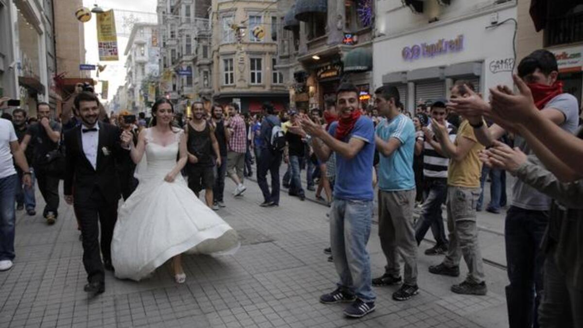 It’s all about peace, love and urban planning down at Taksim square, so what better place to head with your brand new life partner. The happy couple received quite the reception! Let’s hope she changed out of that dress before she met a Turkish policeman