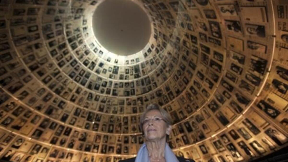 ISREAL: French Foreign Minister Michele Alliot-Marie tours the Hall of Names at the Yad Vashem Holocaust memorial in Jerusalem, January 20, 2011.