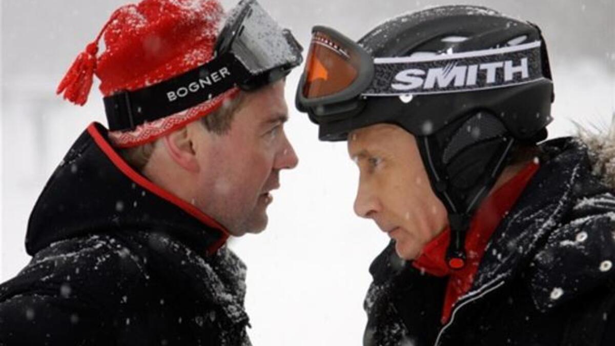Russian President Dmitry Medvedev (L) and Prime Minister Vladimir Putin talking while skiing in Krasnaya Polyana near the Black Sea resort of Sochi. US diplomats refer to Russian President Dmitry Medvedev as a hesitant leader and Prime Minister Vladimir Putin as an "alpha male".