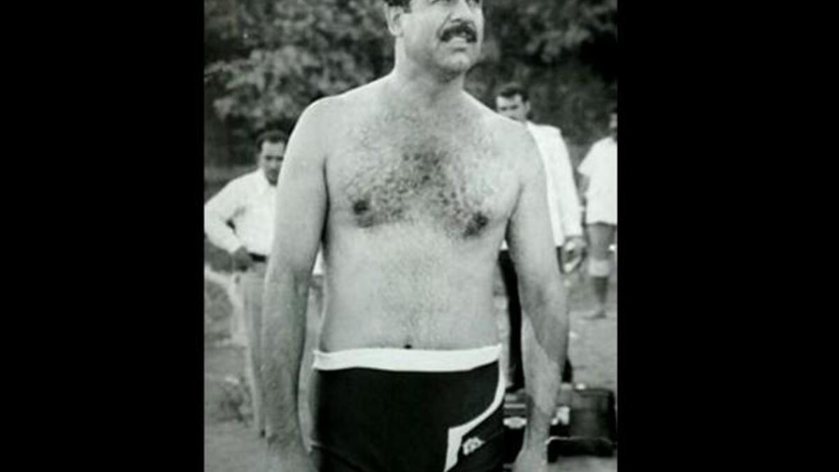 Young Saddam Hussein in bathing suit