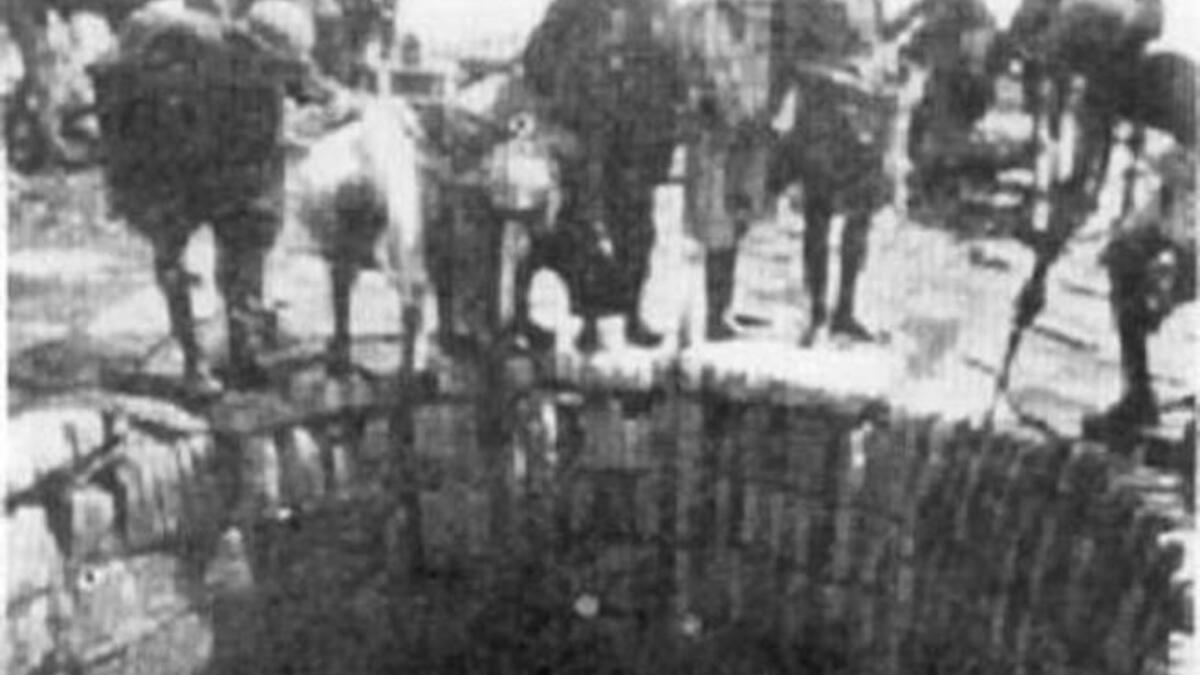 The name of the holy water is onomatopoeic for 'Zomë Zomë', meaning 'stop', a command repeated by Hagar during her startled attempt to contain the surge of spring water-- while a most welcome spectacle-- she feared was being wasted, after her desperate trek to find salvation. Originally, the rudimentary well was surrounded by a stone wall.