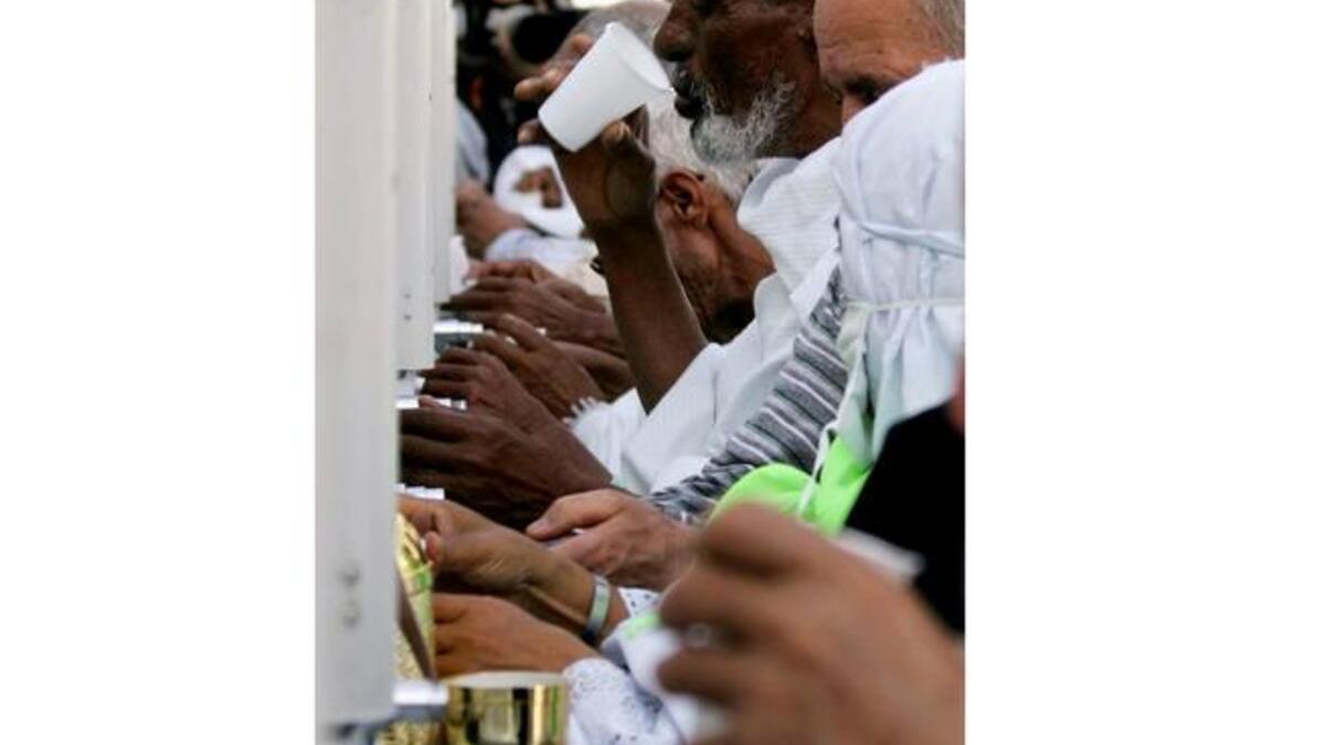 The Zamzam well, excavated by hand, is about 30 m  deep & 1.08 to 2.66 meters in diameter. Today the water is available
 throughout the Masjid al-Haram via water fountains and dispensing containers near the
Tawaf area. The well at one time had two cisterns, one for drinking and one for ablution, and pilgrims still use it  for this dual purpose.