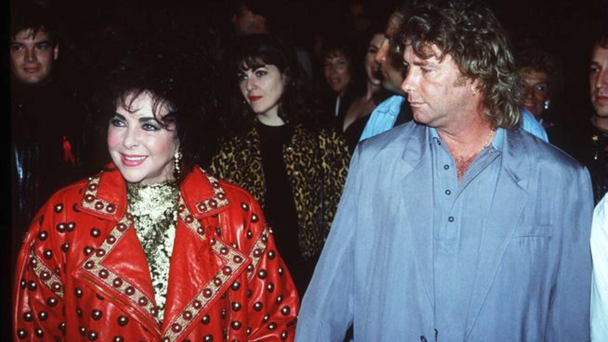 In her later years, known to have a toyboy on her arm: 8th husband of 5 years Larry Fortensky.