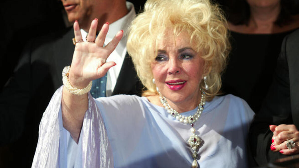 While blonde here, she was famed once for her dark locks in the bob that framed her face, as well as her legendary lusciuos lips, colored to match outfits- common place today, but a rarity earlier on.