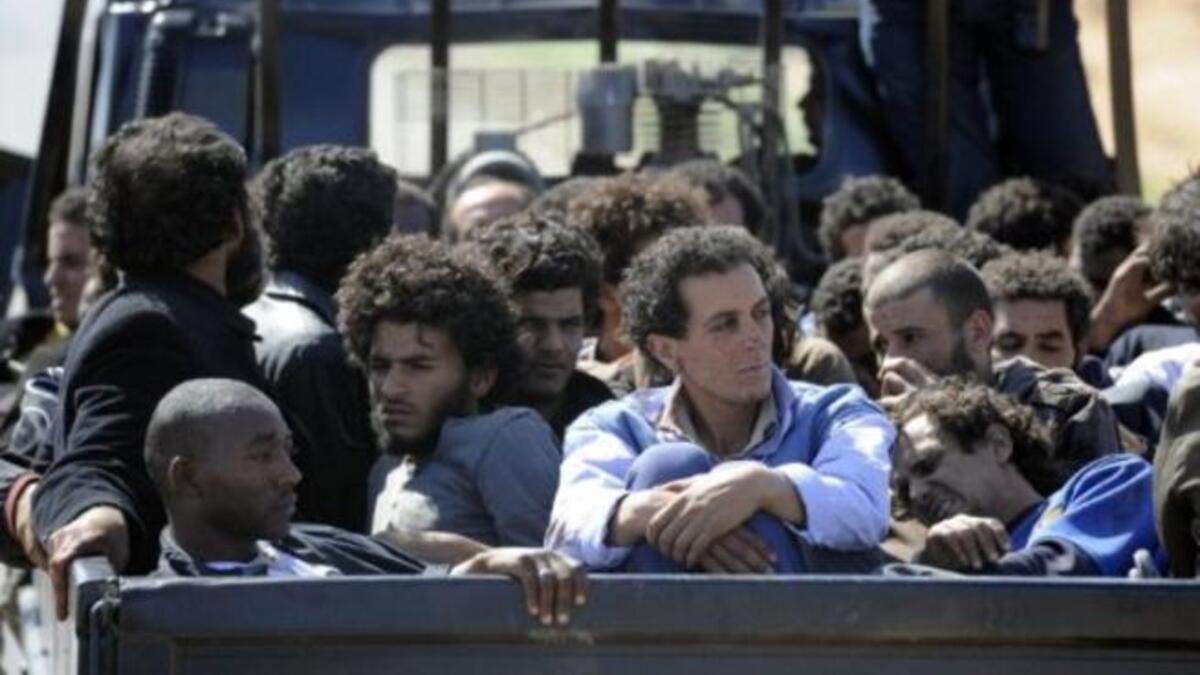 Obama has hailed the end of this tyrant, with the implicit message that other dictators should be afraid. "The rule of an iron fistinevitably comes to an end".  An NTC vehicle transports loyalists to Gaddafi, after the Libyan leader's capture in the coastal cityof Sirte. While rough-handled, they were spared their lives, as promised by the NTC.