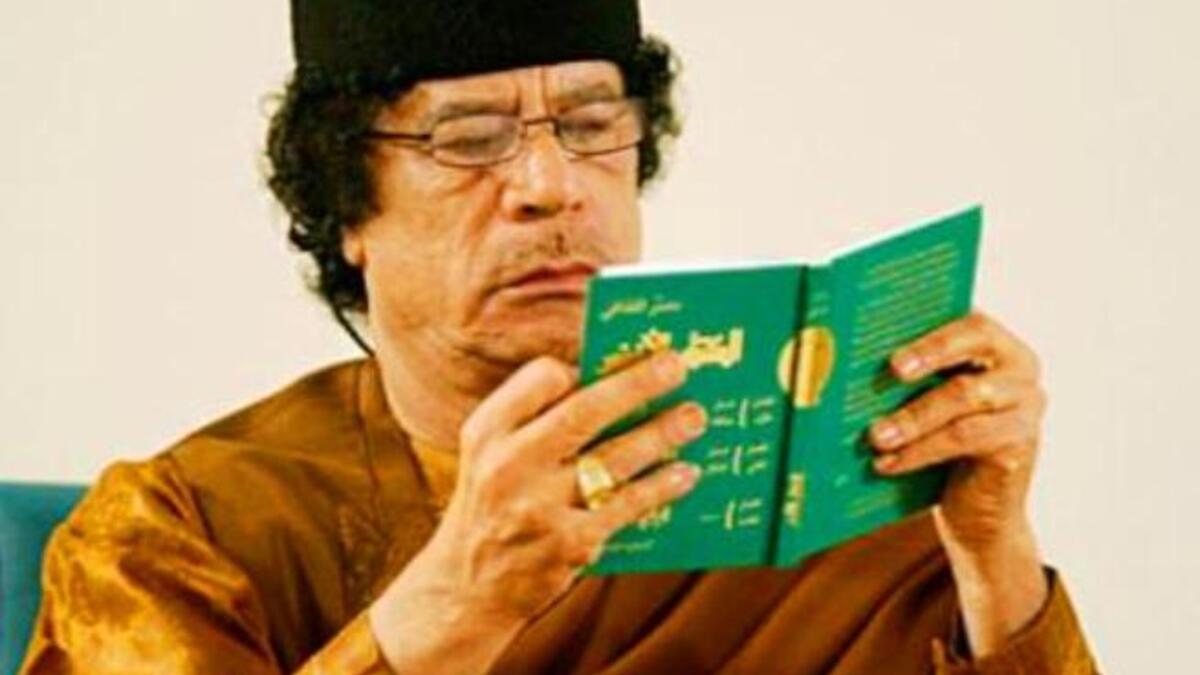 His people- who the hit parody Zenga-Zenga threatens ('I will come after you house, house, alley by alley')-  are 'rats and
'cockroaches', and drugs and foreigners are to blame for their rebellion.  He displays his Green Book - which rose to fame for
its 'Qaddafiisms'-  unsound logic-  the founding principles for his ideology.