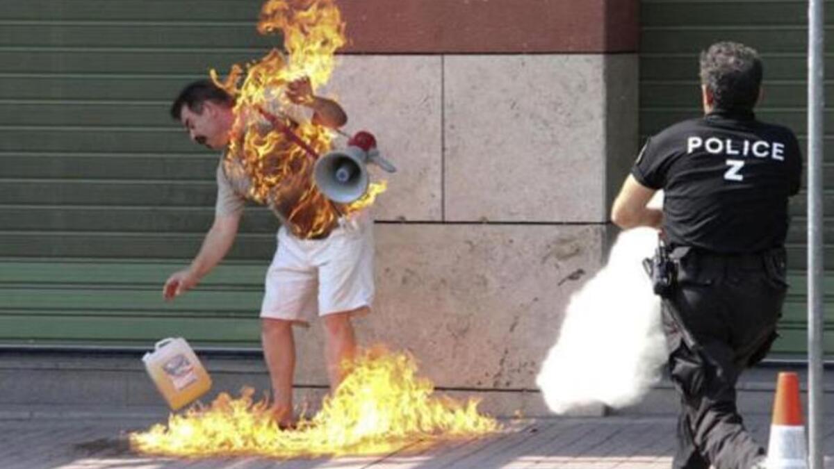 Greek man burns himself in protest