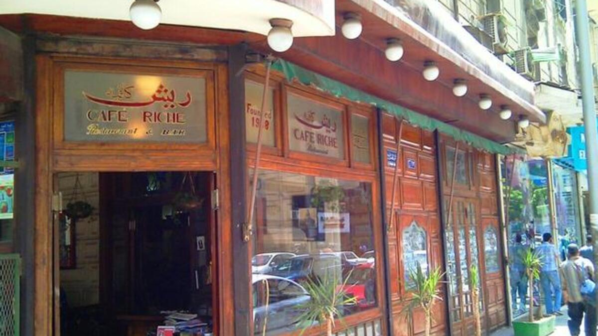 Change through the eyes of Cairo's constant café: Part of the cityscape since 1908, Café Riche gives a neat vantage for revolution-watch. Revolutionaries all the century have indulged in politics & Turkish coffee here. A stone's throw away from Tahrir, this den has weathered 1919 & 1952, and in 2011 pumps caffeine through the veins of Tahrir Sq.