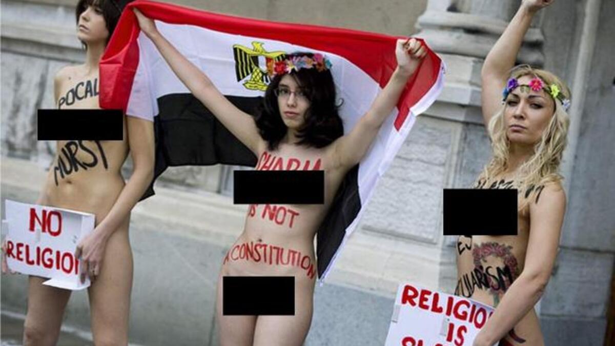 Egyptian naked blogger strips for Sharia law