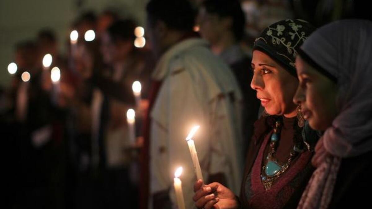 Alexandria lights candles for New Year 2013
