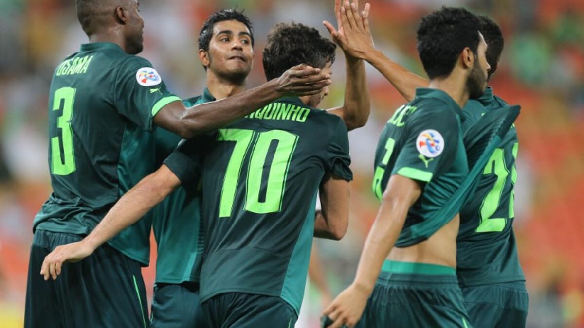 Saudi's Al-Ahli club players celebrate after scoring a goal during their AFC Champions League group D football match against Qatar's El-Jaish club at the King Abdullah Spots City in Jeddah on May 3, 2016. Al-Ahli won the match 2-0.
STRINGER / AFP