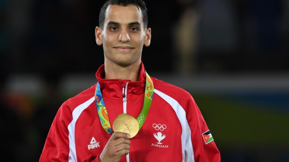 لاعب التايكواندو الأردني أحمد أبو غوش: ذهبية وزن 68 كيلوغرام.