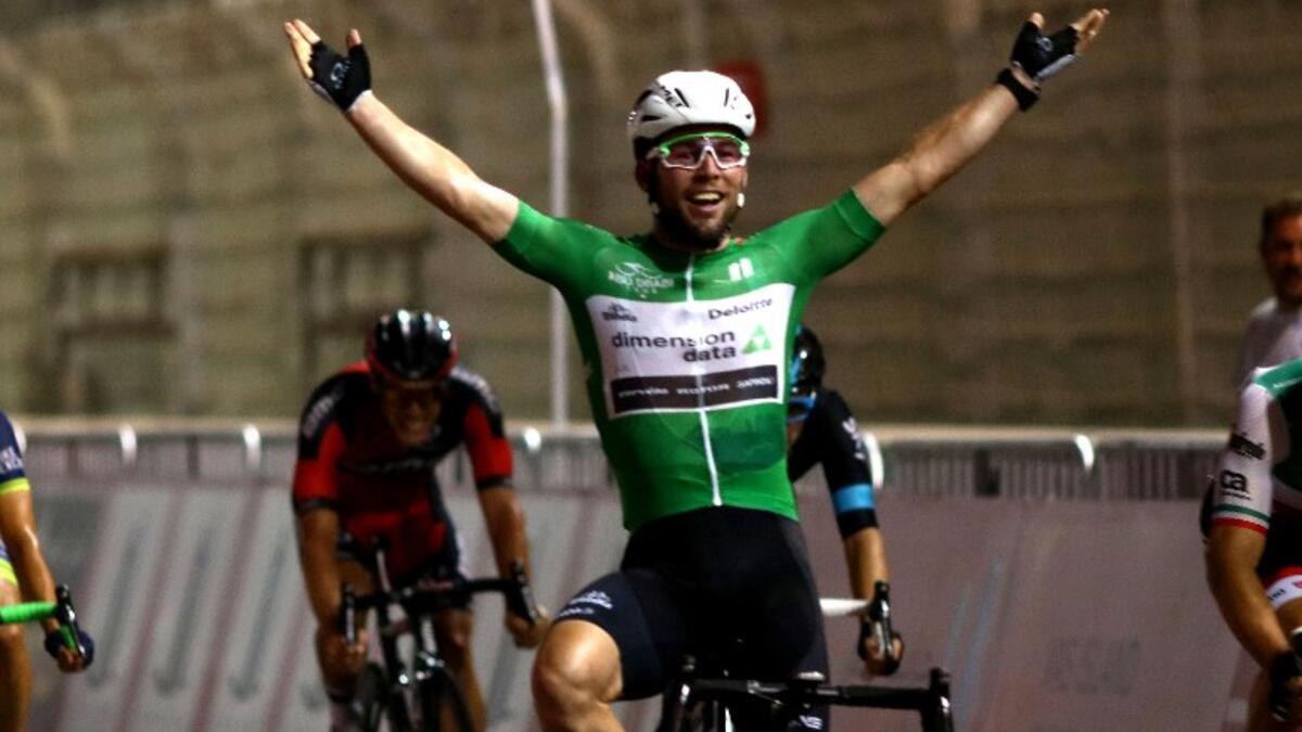 Mark Cavendish of Great Britain celebrates winning the fourth stage of the Abu Dhabi Tour in Yas Marina Circuit, in the United Arab Emirates, on October 23, 2016. Estonia's Tanel Kangert of the Astana team clinched the Tour of Abu Dhabi on Sunday at Yas Marina.
NEZAR BALOUT / AFP