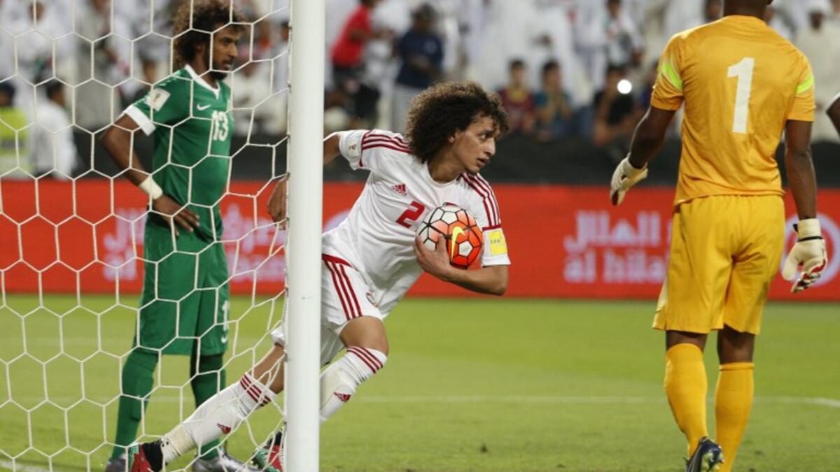 UAE's Omer Abdulrahman celebrates after scoring against Saudi Arabia during their World Cup 2018 Asian qualifying football match on March 29, 2016 at the Mohammed Bin Zayed Stadium in Abu Dhabi.
KARIM SAHIB / AFP