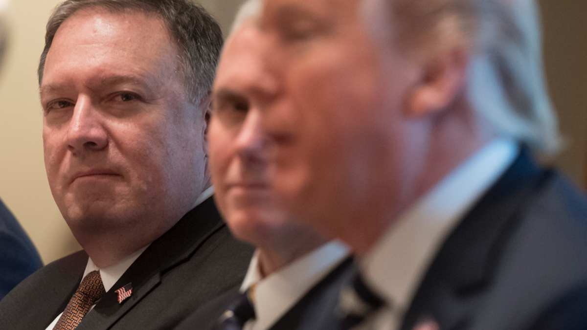 CIA Director and Secretary of State nominee Mike Pompeo (L) attends a lunch meeting with U.S. President Donald Trump (R) and Saudi Arabia's Crown Prince Mohammed bin Salman, and members of his delegation, in the Cabinet Room of the White House in Washington, DC, March 20, 2018.  (SAUL LOEB / AFP)