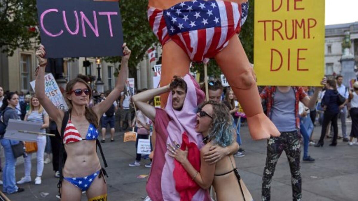 Tens of thousands of protesters demonstrated in London on Friday against US President Donald Trump, whose four-day visit to Britain has been marred by his extraordinary attack on Prime Minister Theresa May's Brexit strategy. (Niklas HALLEN / AFP)