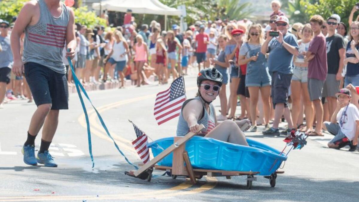 San Clemente residents every year celebrates 4th of July with informal 'Office Chair Races'. (Jeff Gritchen, Orange County Register/SCNG)